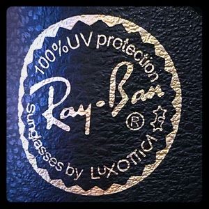 3 Ray Ban sunglass cases.